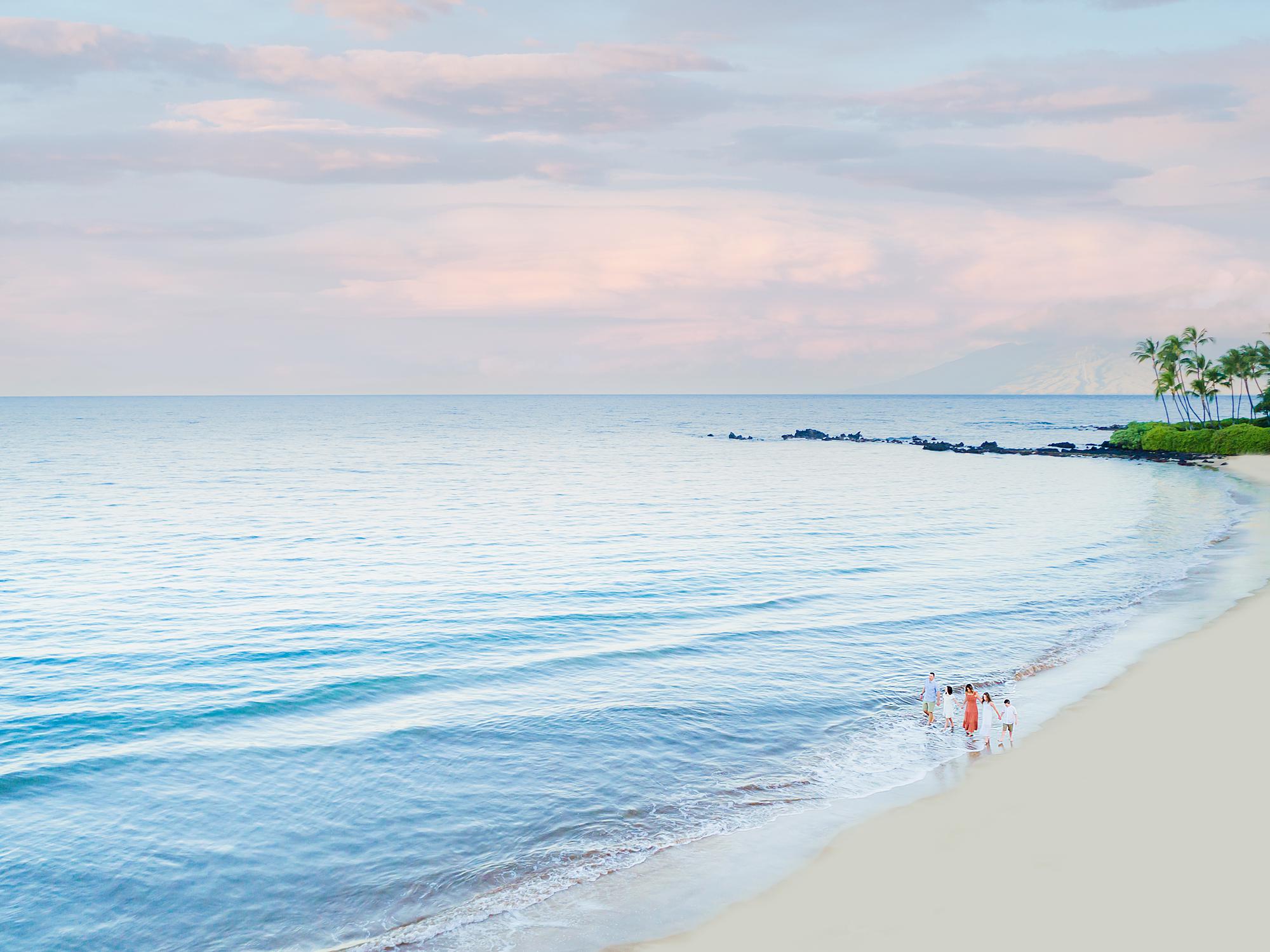 maui drone portrait on a beach in wailea featuring family photography by love and water