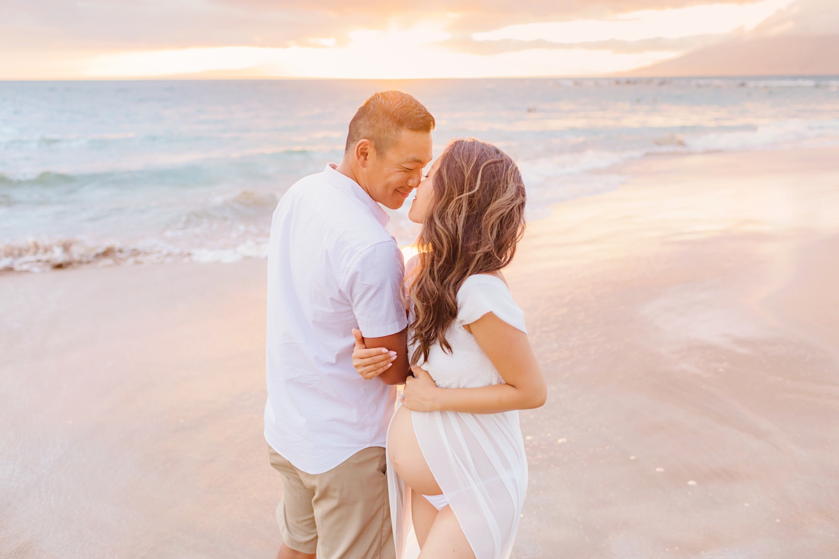 Romantic sunset Wailea babymoon portraits at the beach with Love + Water