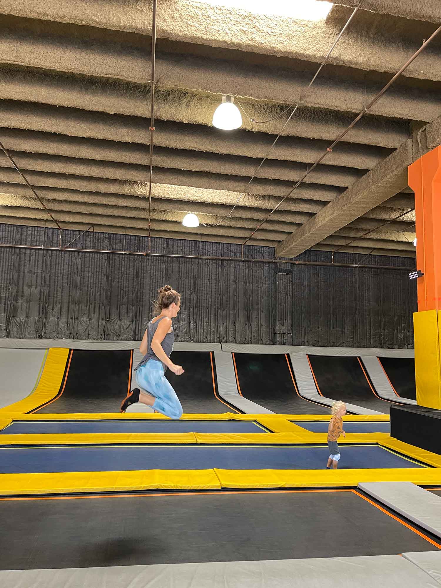 mother jumping with toddler at ultimate air trampoline park on maui as an autism friendly activity