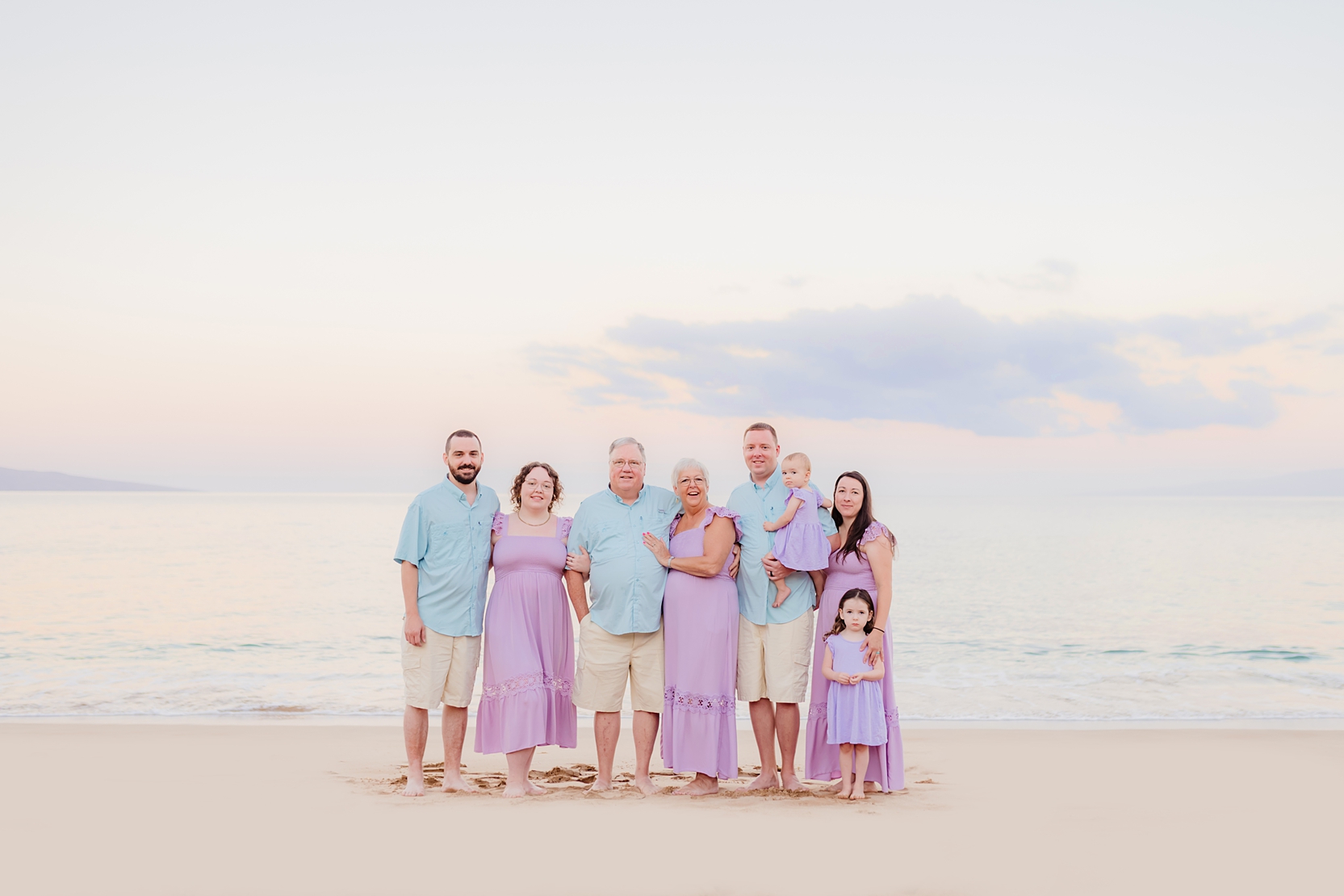 Sunrise Maui family pictures with coordinating violet purple outfits