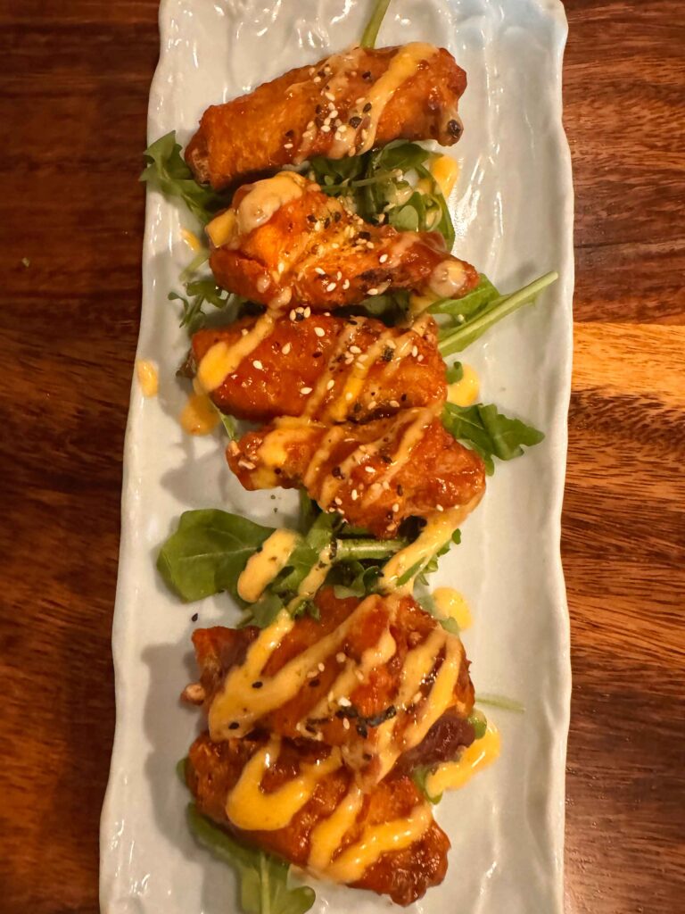 Wings and shrimp tempura roll at oao sushi in Wailea, one of the best happy hour spots in south maui