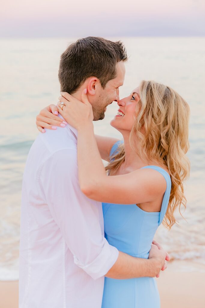 Maui photographers capture woman looking up and smiling at her new husband