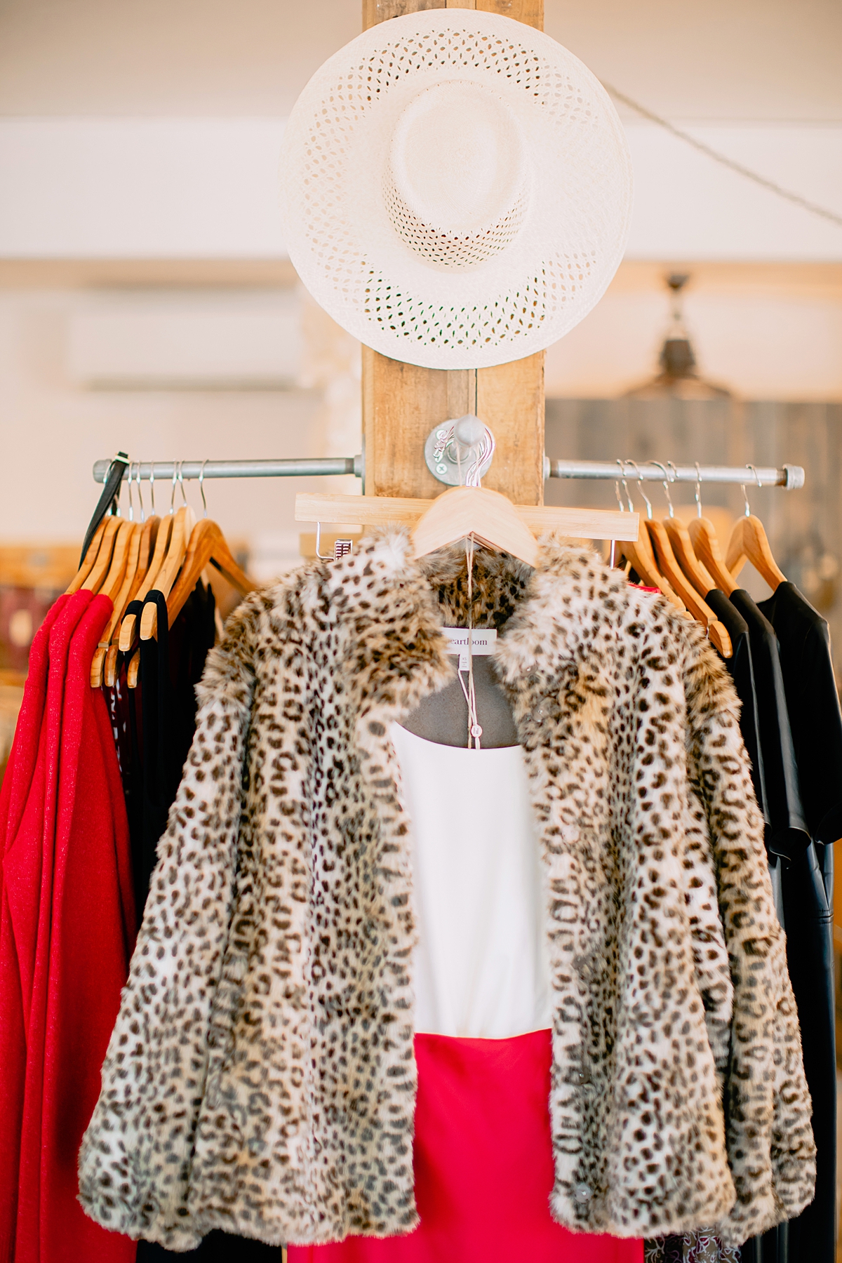 hat and cheetah print faux fur jacket at driftwood maui boutique