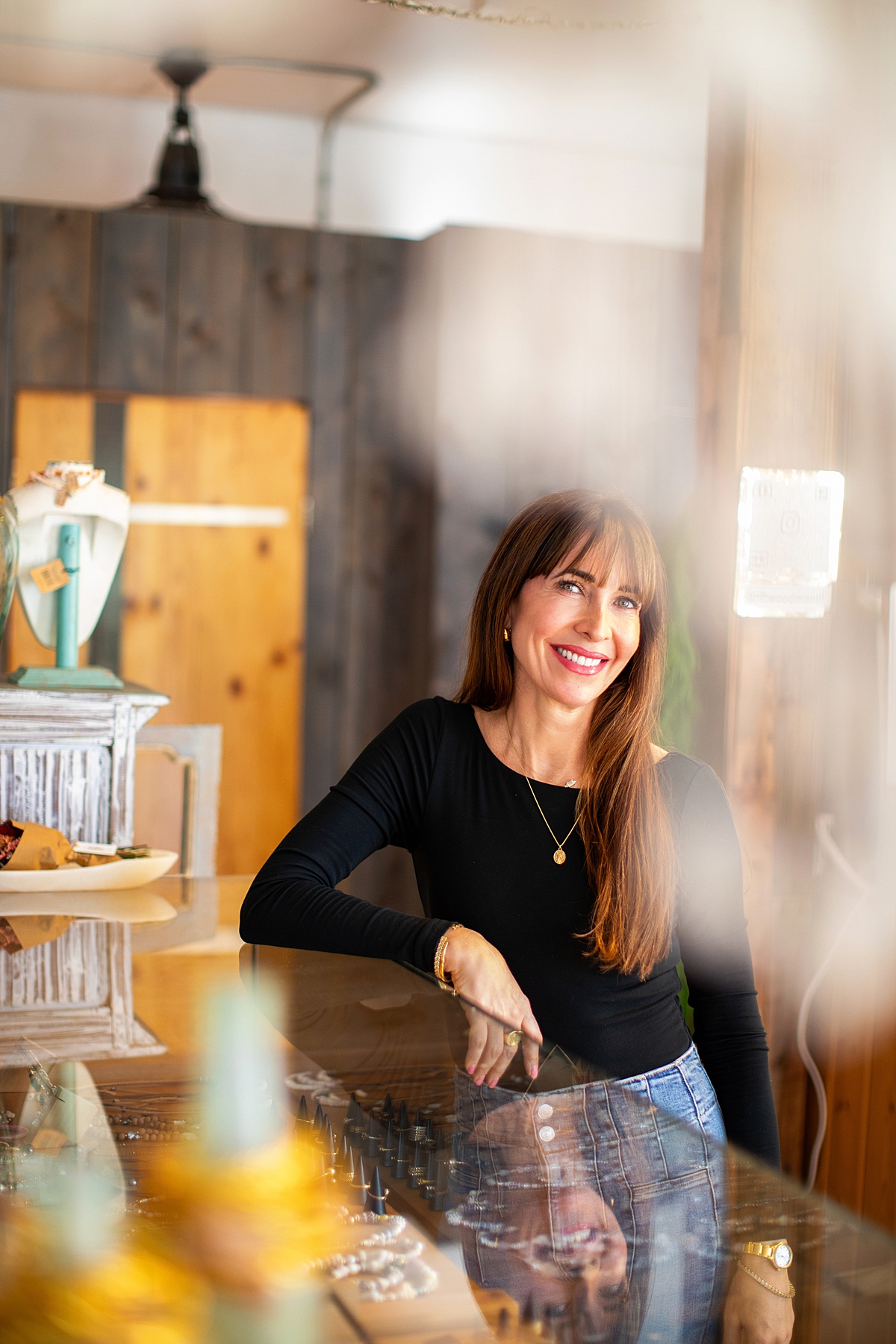 driftwood maui owner carrie gibb poses inside her boutique in makawao photographed by love and water