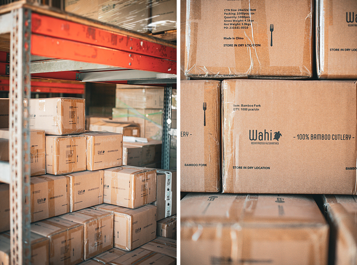 boxes stacked in a warehouse selling goods by wahi Hawaii on maui, photographed by love and water